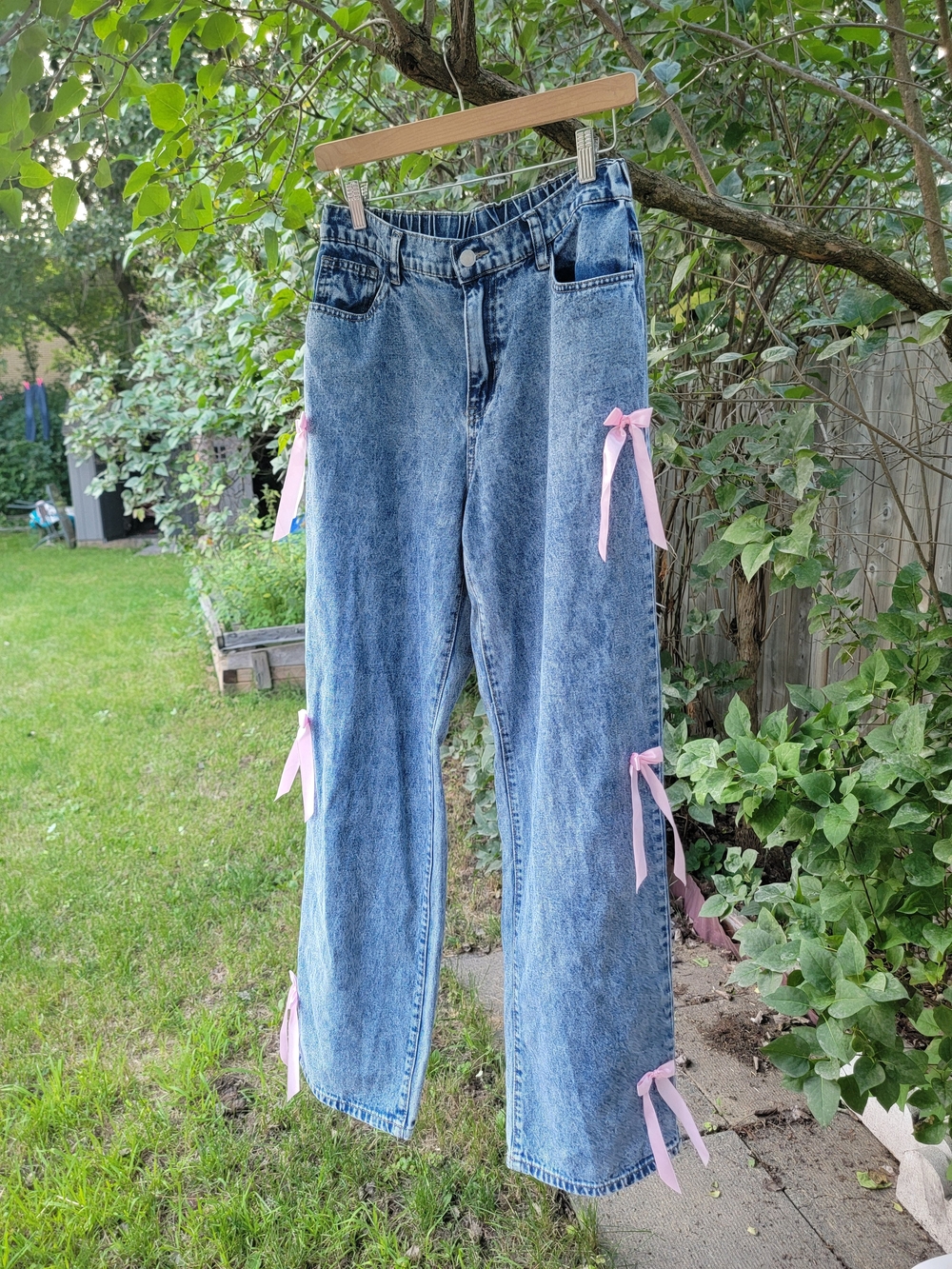 High-Waist Blue New Denim Jeans with Pink Ribbon Accents